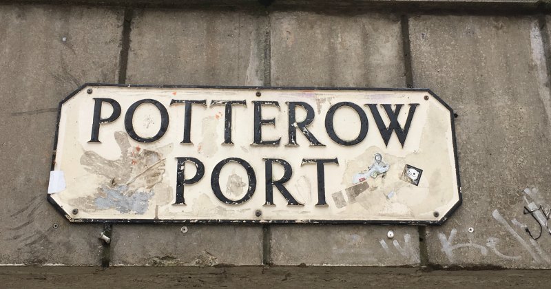 a street sign for potterow port