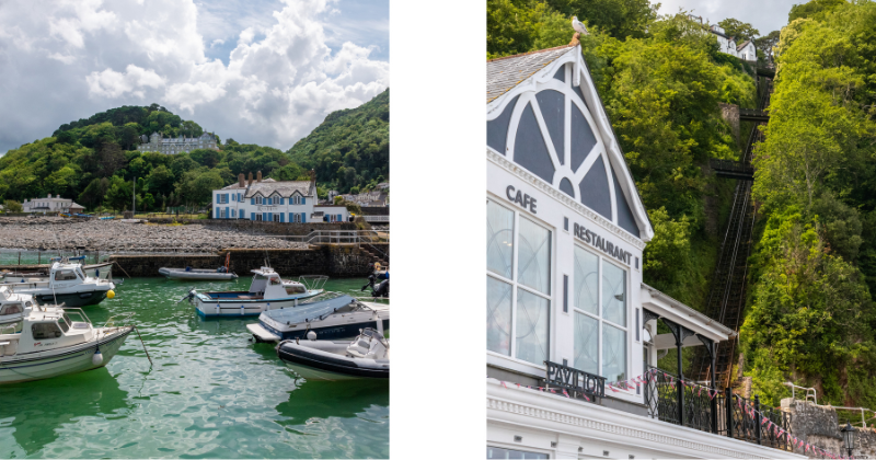 Boats bob in the green waters by a charming seaside café, framed by lush hills under a partly cloudy sky.
