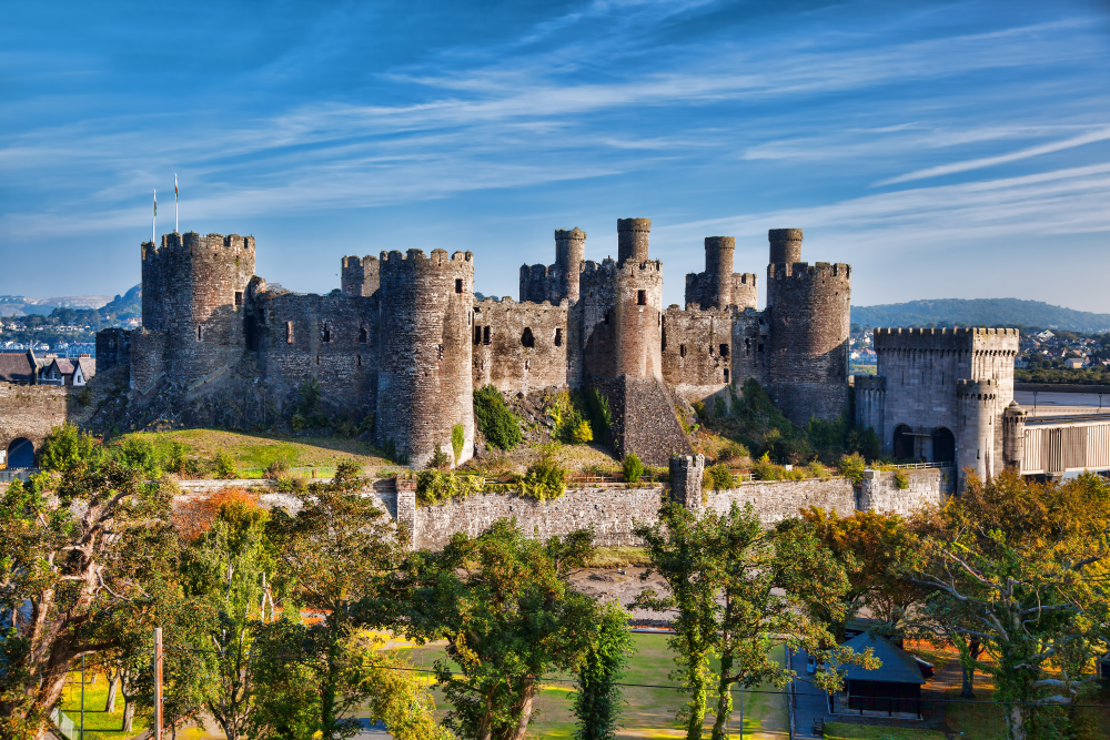 exterior of conwy castle with blue sky above