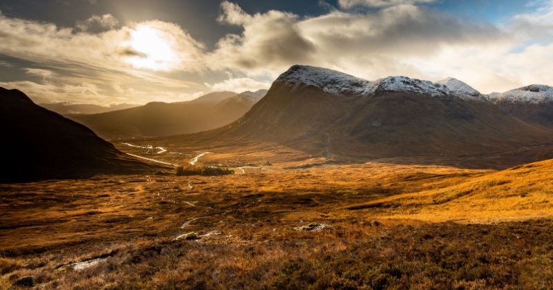 a beautiful valley at sunset