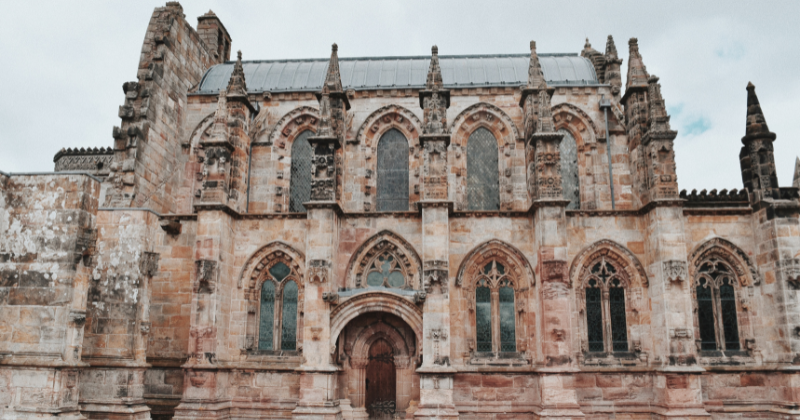 a stone building with spires