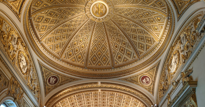 gold domed ceiling inside a gallery
