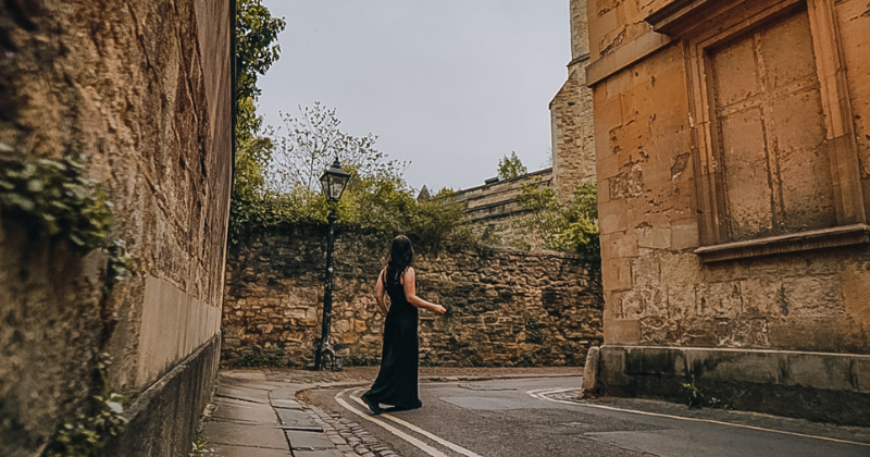 woman in the middle of an Oxford street