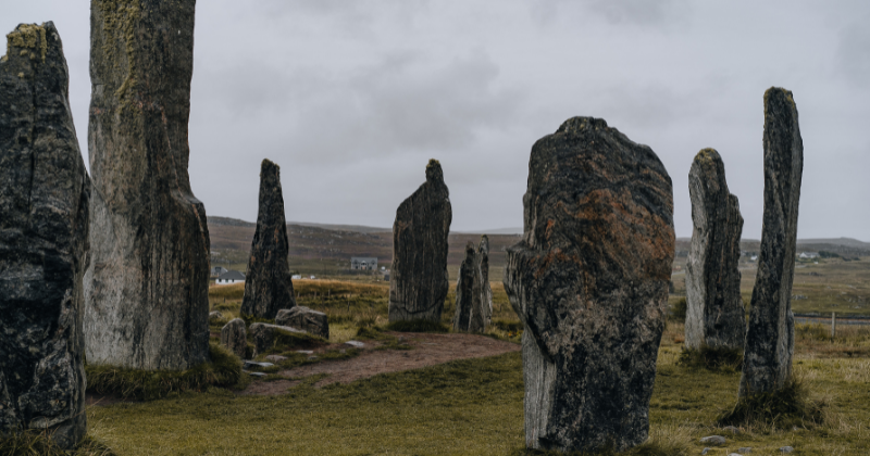 standing stones with mossy green grass below