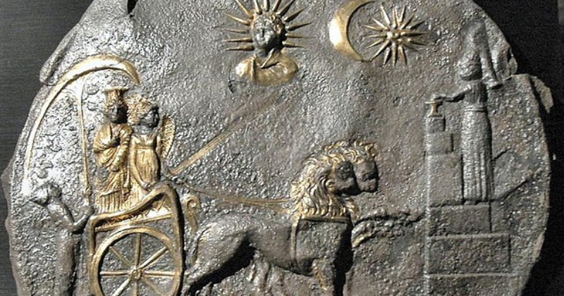 stone carving from Roman times with gold highlights