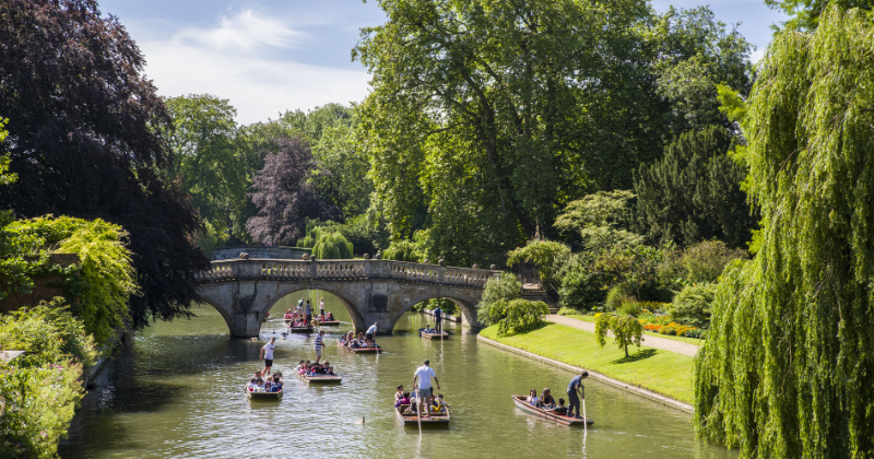 people on boats drifting down the river