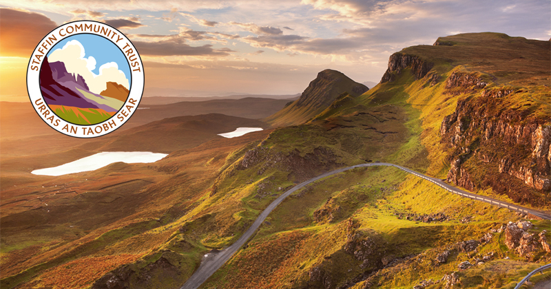 Green and brown rocky mountain landscape with the Staffin Community Trust logo