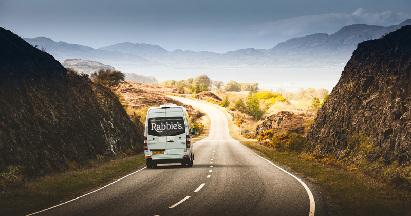 rabbie's bus driving along an open mountain road