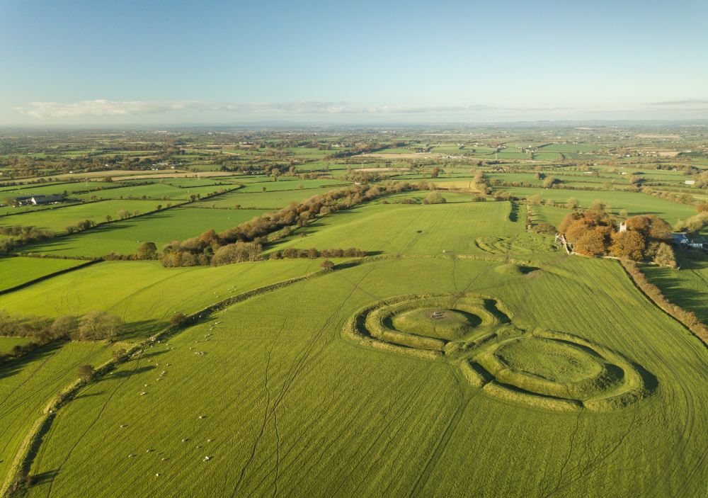 green fields with two mounts for the hill of tara from bird eye view