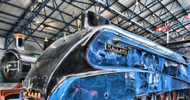 Mallard Blue train stationary in York station
