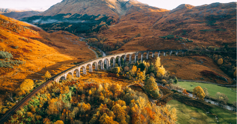 a stone viaduct in a landscape