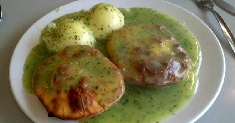 pie and mash covered in mint sauce