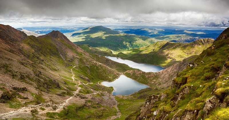 bird eye view looking down at the mountain region with two lakes in the middle