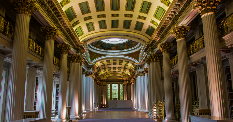 a large domed room with columns