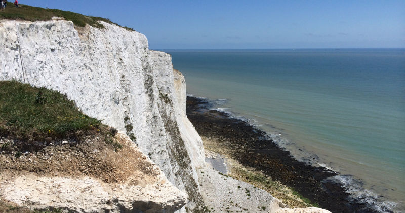 white cliffs overlooking an ocean